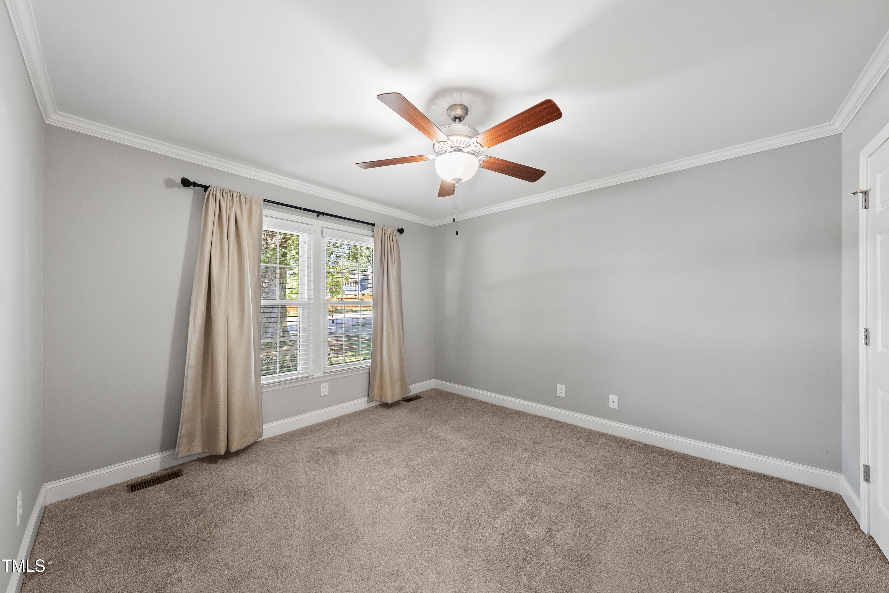 405 East Millbrook Road Raleigh, NC 27609 - Photo 14 of 23 First Floor Bedroom