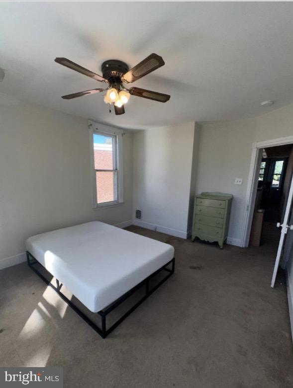 304 East Front Street Media, PA 19063 - Photo 8 of 9 a bed sitting in a room next to a window