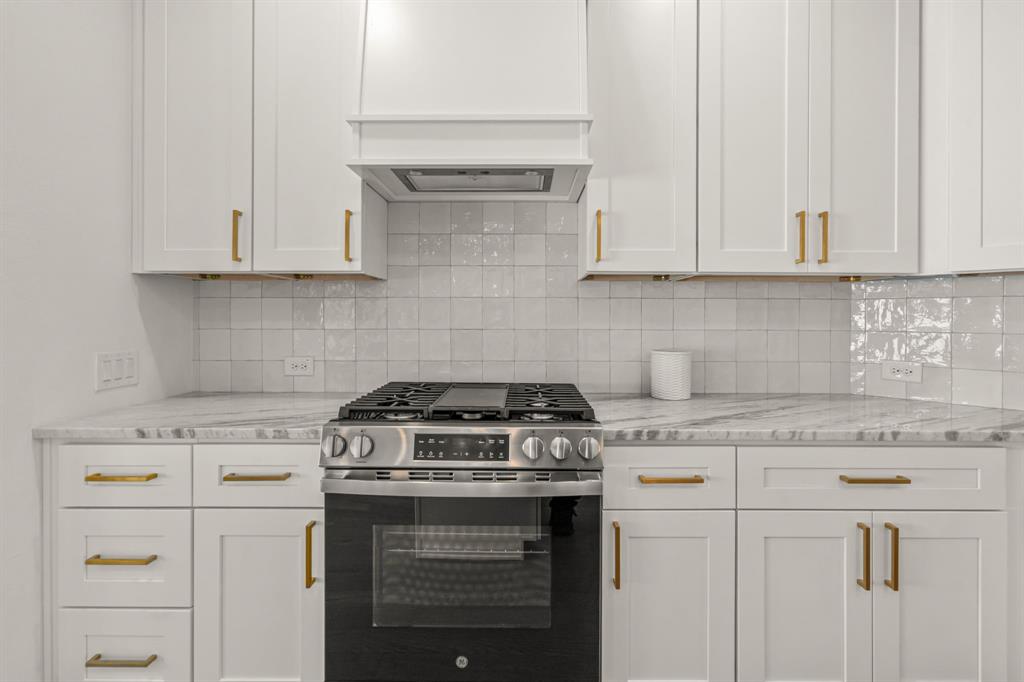 5720 Randolph Court Westworth Village, TX 76114 - Photo 20 of 40 a kitchen with cabinets appliances and a sink