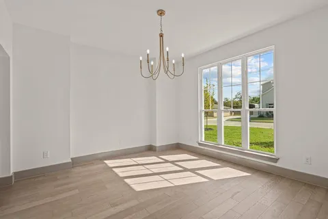 a view of a room with windows