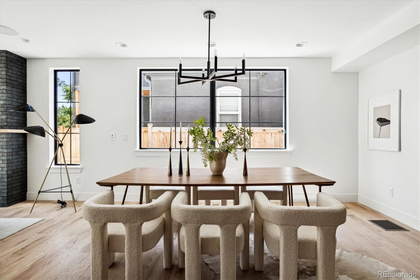 2228 Lowell Boulevard Denver, CO 80211 - Photo 16 of 49 a view of a dining room with furniture and window
