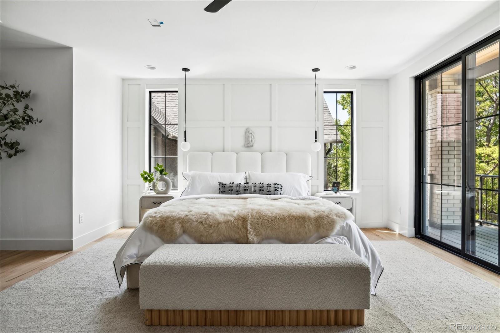 2228 Lowell Boulevard Denver, CO 80211 - Photo 24 of 49 a living room with a couch and a window