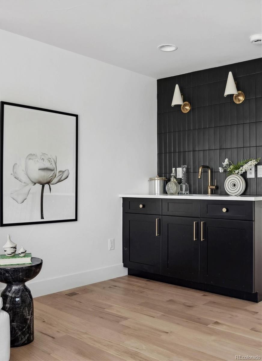 2228 Lowell Boulevard Denver, CO 80211 - Photo 36 of 49 a living room with furniture