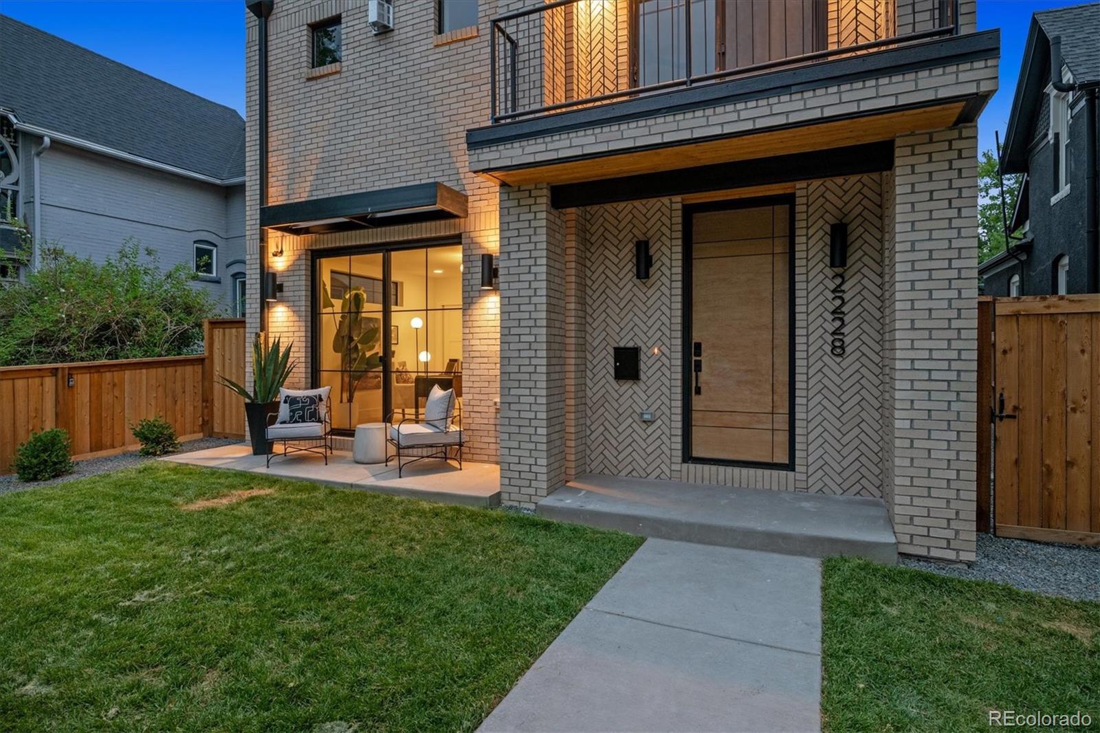 2228 Lowell Boulevard Denver, CO 80211 - Photo 48 of 49 a view of a house with backyard porch and garden
