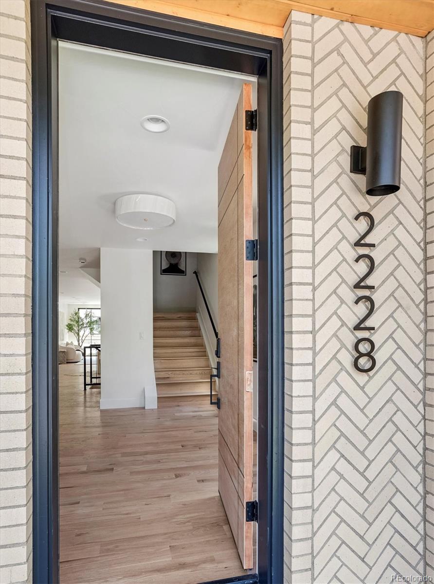 2228 Lowell Boulevard Denver, CO 80211 - Photo 6 of 49 a view of entryway and hall with wooden floor