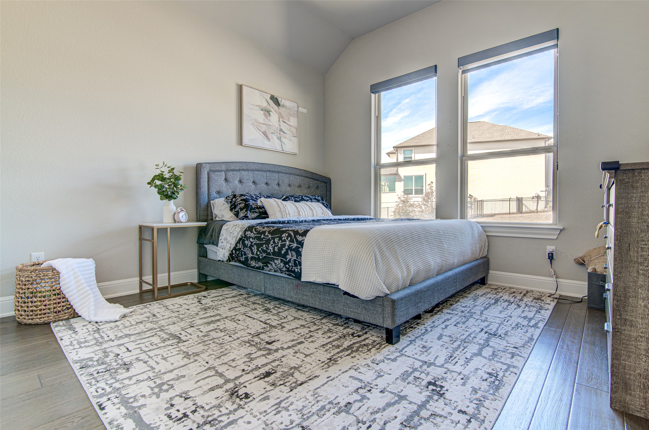 4309 Olive Grv Cove Leander, TX 78641 - Photo 19 of 27 Bedroom featuring hardwood / wood-style flooring and vaulted ceiling