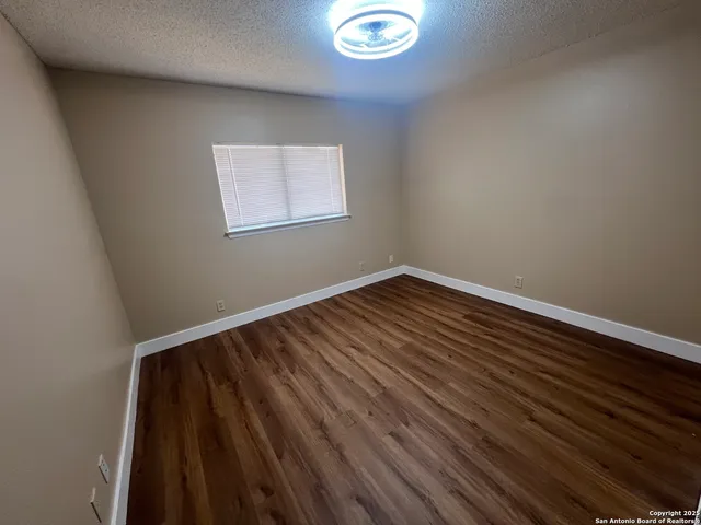 a view of wooden floor in a room