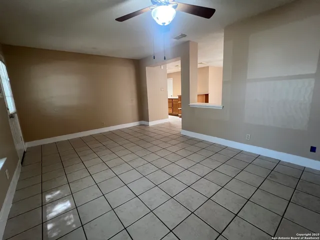 a view of an empty room and window