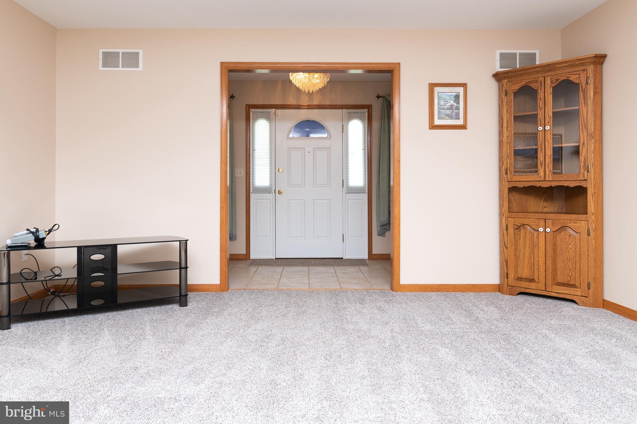 125 Debs Way Dover, DE 19901 - Photo 5 of 31 Living room looking towards front door