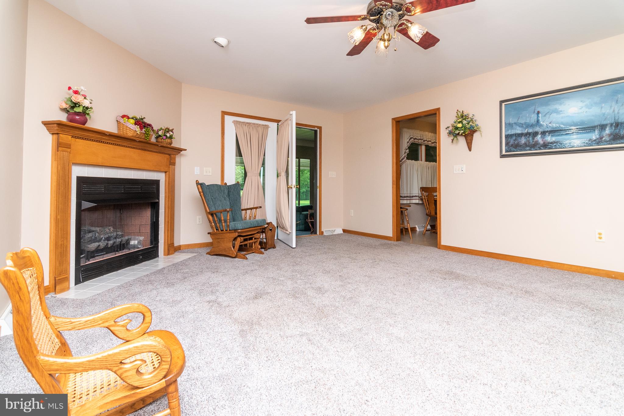 125 Debs Way Dover, DE 19901 - Photo 6 of 31 Living room with corner fireplace