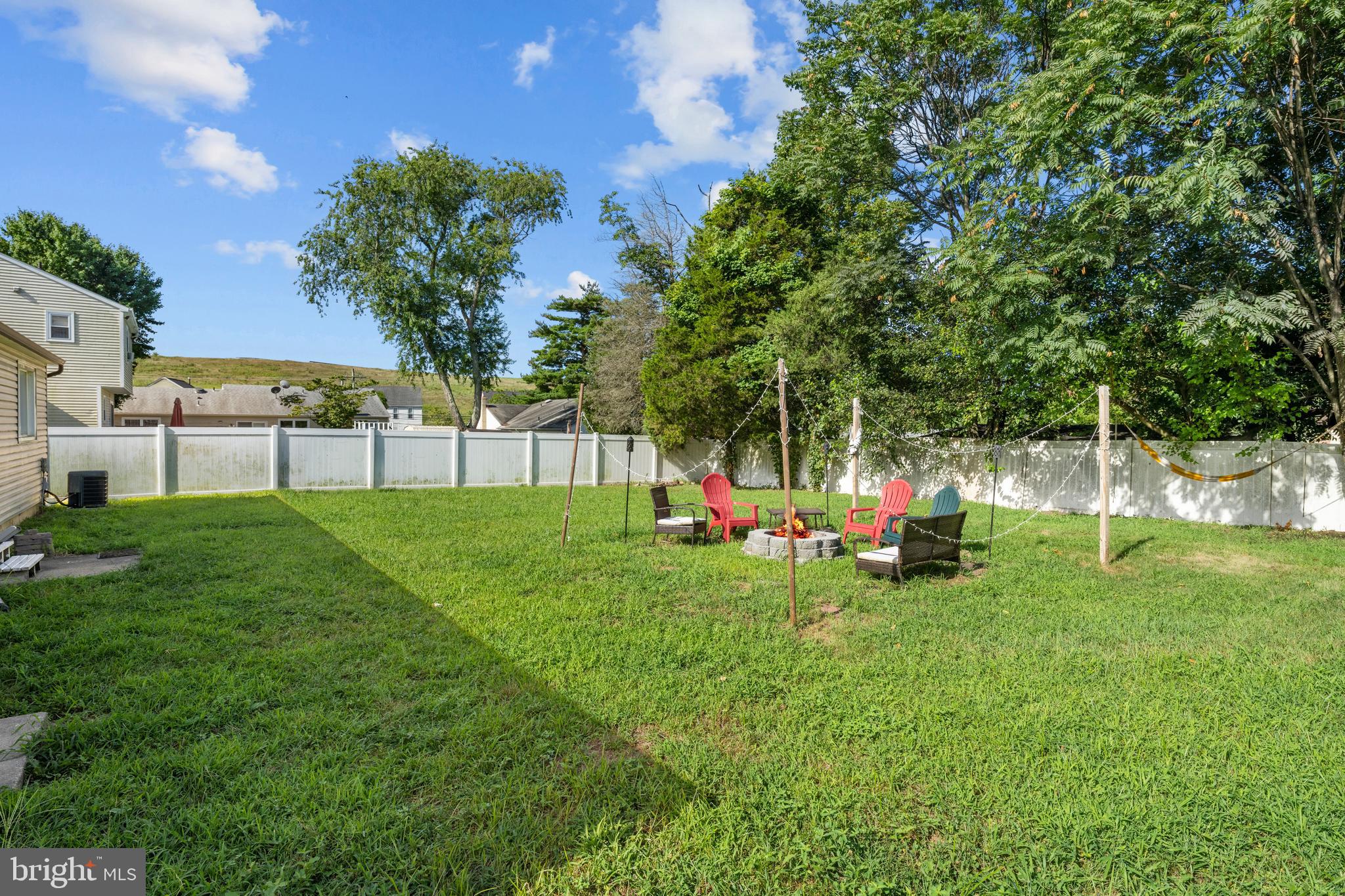 5 Fox Chase Drive Blackwood, NJ 08012 - Photo 20 of 23 a view of a park with large trees and couches