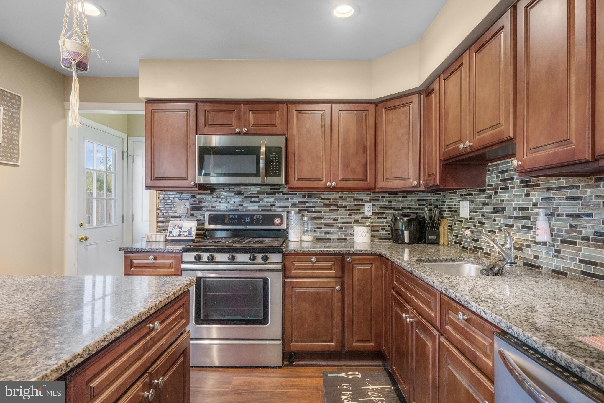 5 Fox Chase Drive Blackwood, NJ 08012 - Photo 9 of 23 a kitchen with a sink stove and microwave