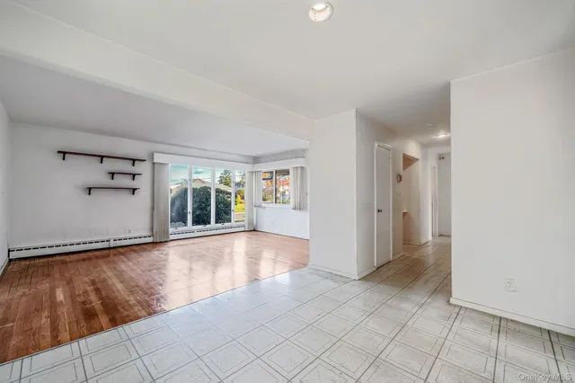 a view of an empty room with window