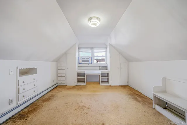 wooden floor and white walls