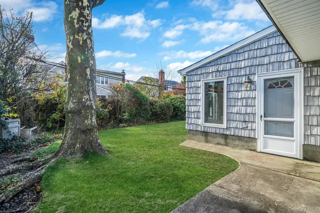 a view of a house with a garden
