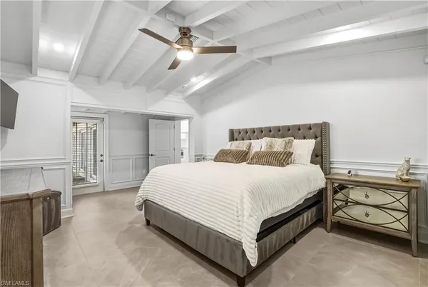 a bed room with a bed and a fireplace