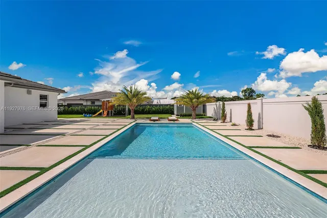 a view of a house with a swimming pool