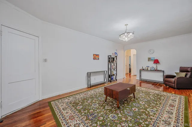 a living room with a rug