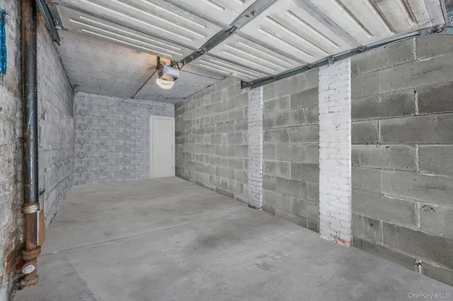 a view of a porch with wooden floor and fence