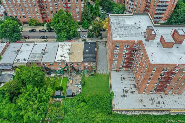 an aerial view of a house with outdoor space