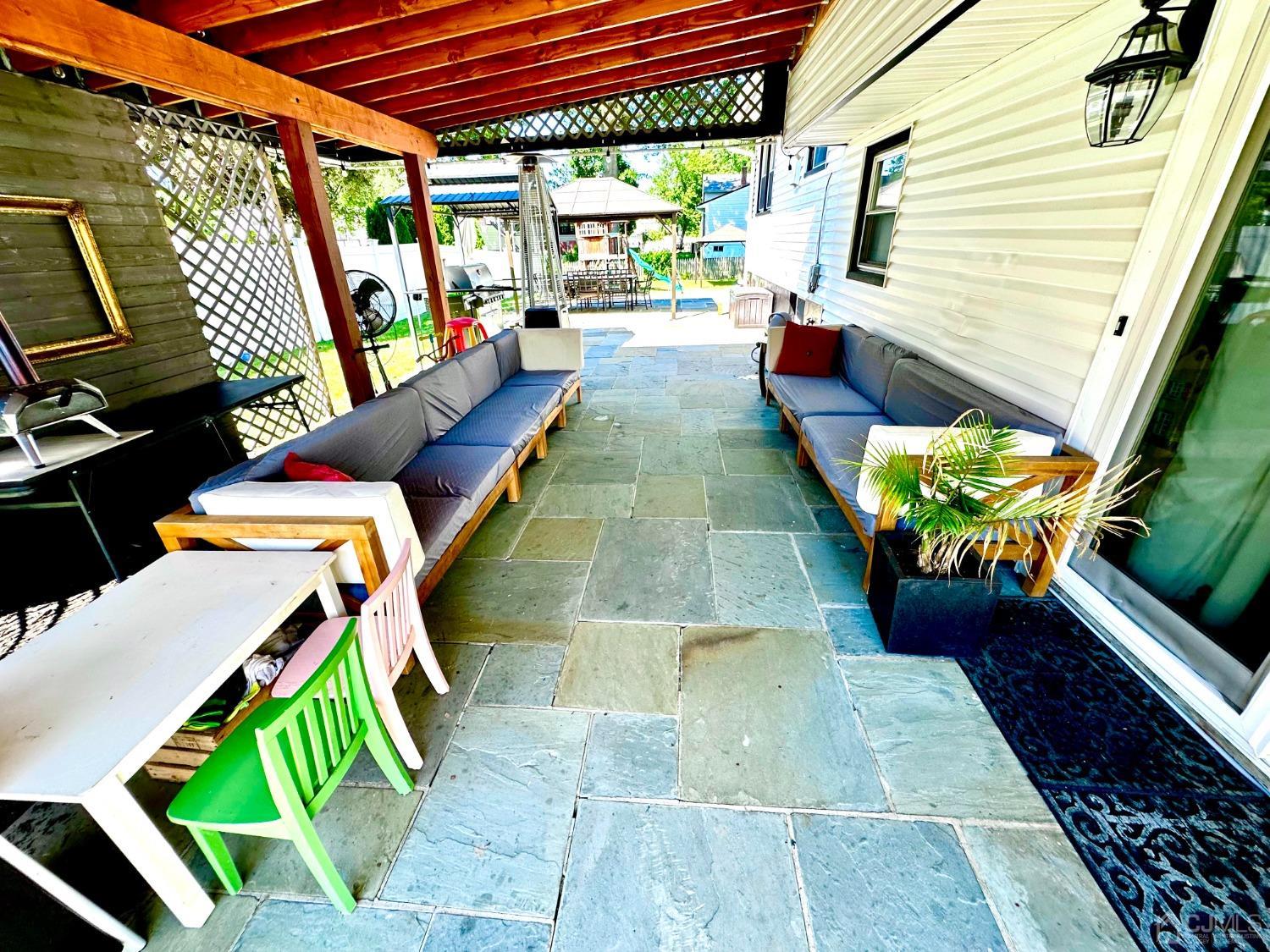 3 South Gate Springfield, NJ 07081 - Photo 20 of 22 a view of deck with patio