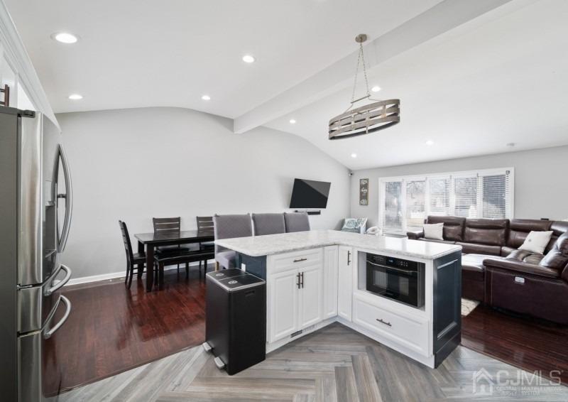 3 South Gate Springfield, NJ 07081 - Photo 7 of 22 a kitchen with a sink appliances and cabinets