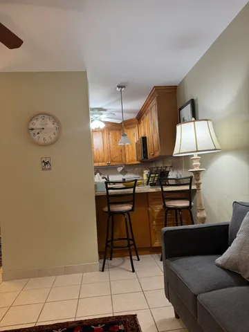 a living room with a couch and a table