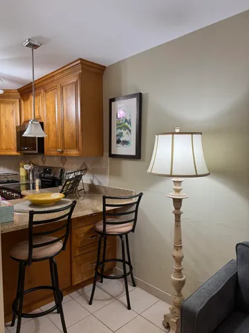 a view of a workspace with furniture