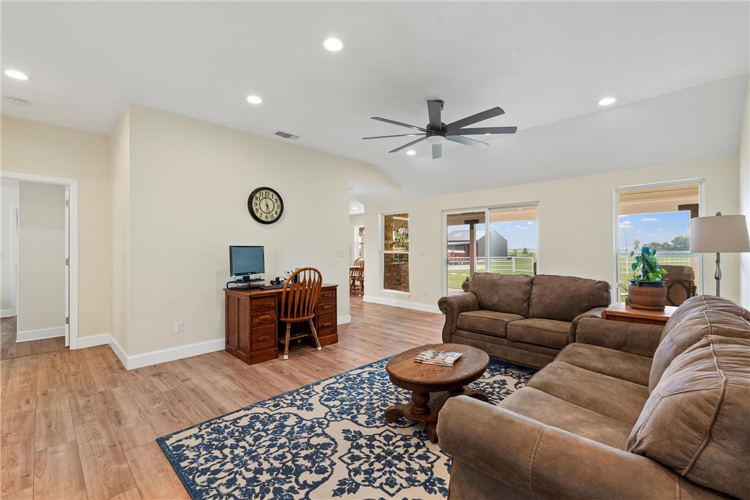 1748 Downsville Road Robinson, TX 76706 - Photo 16 of 65 a living room with furniture ceiling fan and a rug