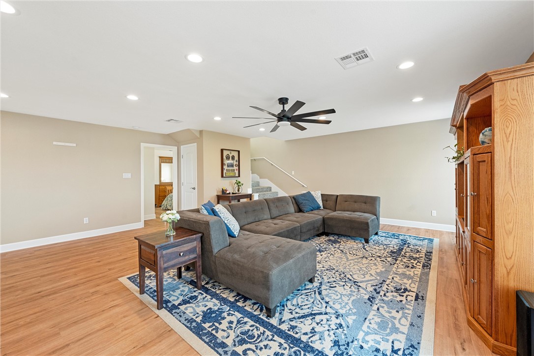 1748 Downsville Road Robinson, TX 76706 - Photo 28 of 65 a living room with furniture and a rug