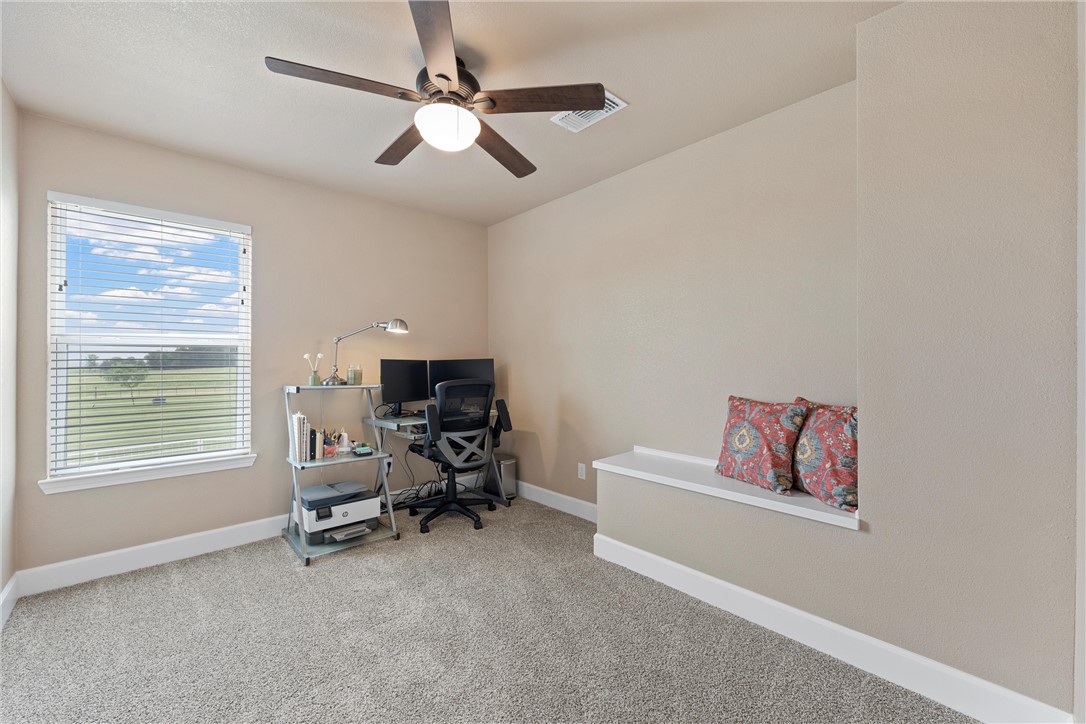 1748 Downsville Road Robinson, TX 76706 - Photo 35 of 65 a living room with furniture and a window
