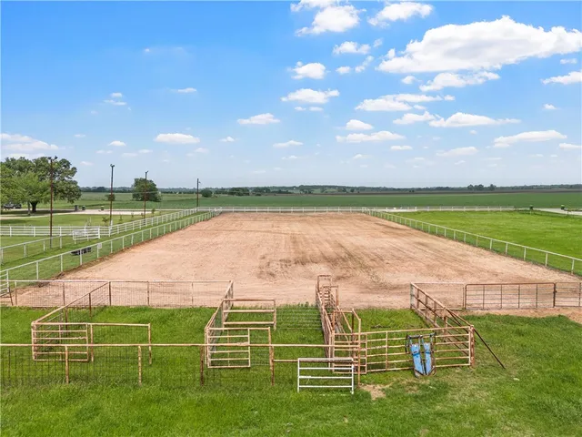 a view of a house with a big yard