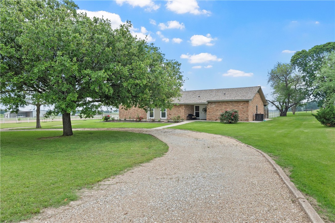 1748 Downsville Road Robinson, TX 76706 - Photo 59 of 65 a front view of house with yard and green space
