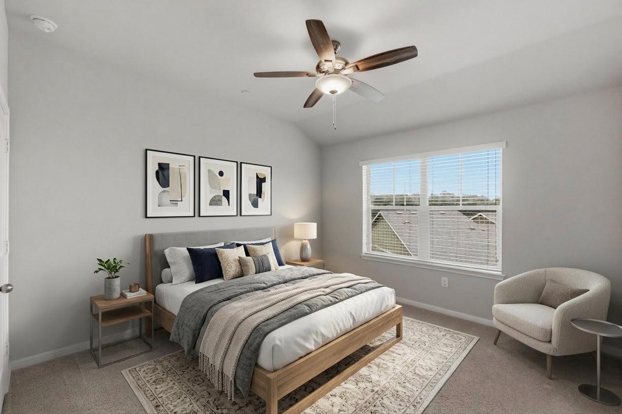 516 East Slaughter Lane, Unit 2402 Austin, TX 78744 - Photo 16 of 27 a bedroom with a bed and window