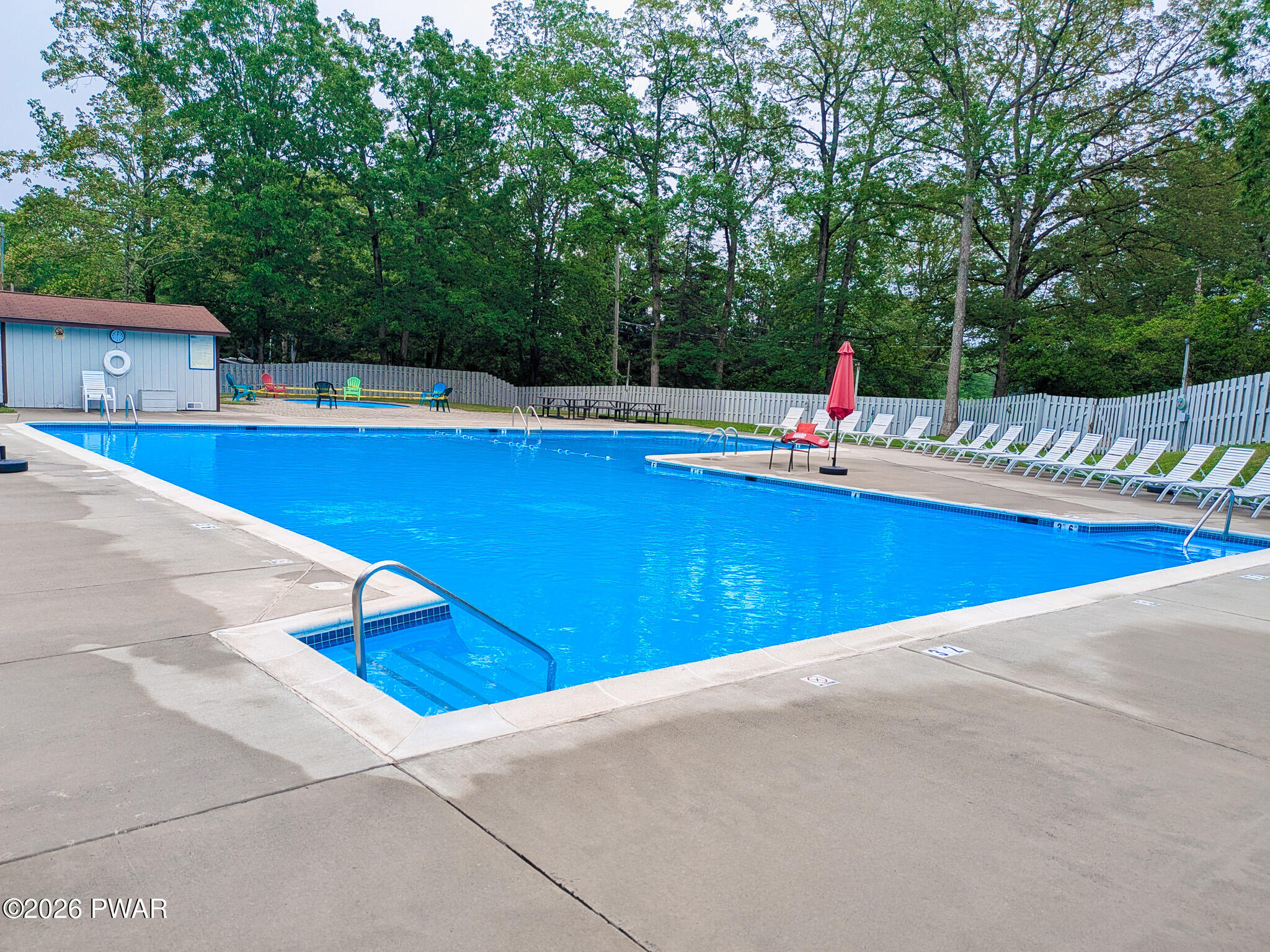 102 Rodney Road Milford, PA 18337 - Photo 11 of 11 a view of a swimming pool with a yard