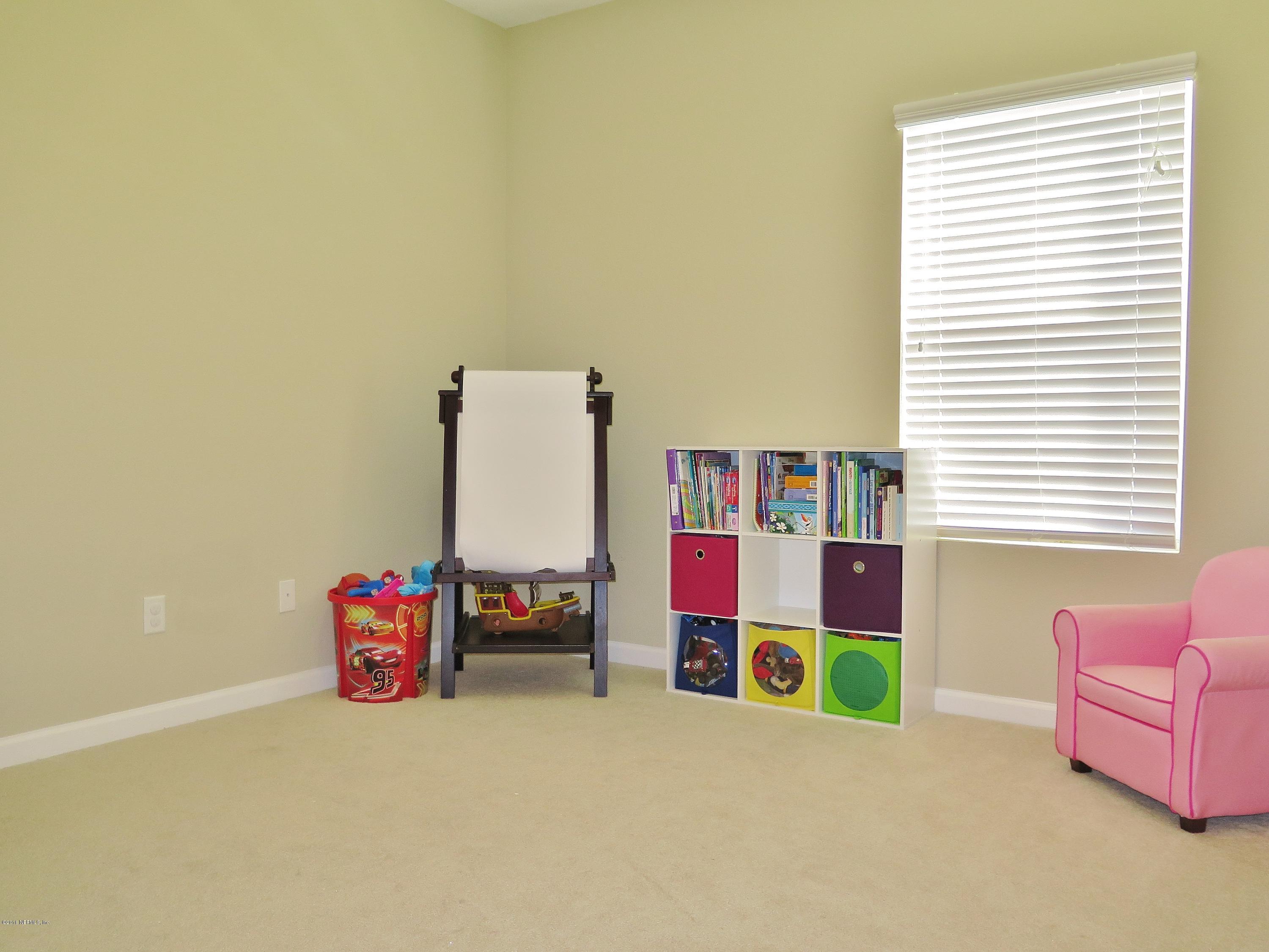 16504 Tisons Bluff Road Jacksonville, FL 32218 - Photo 18 of 34 a room with toys and a flower pot