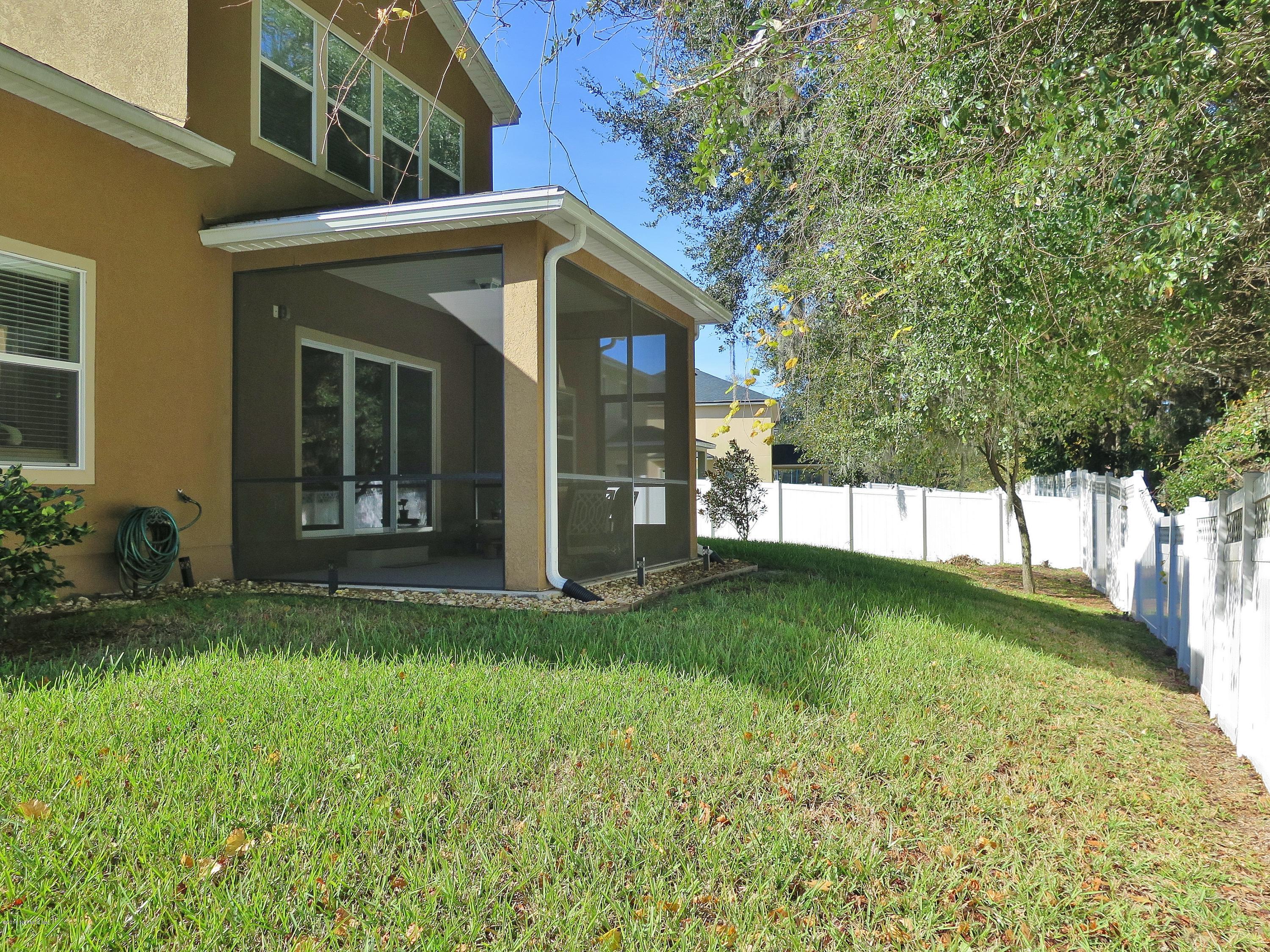 16504 Tisons Bluff Road Jacksonville, FL 32218 - Photo 23 of 34 a view of a house with backyard and garden