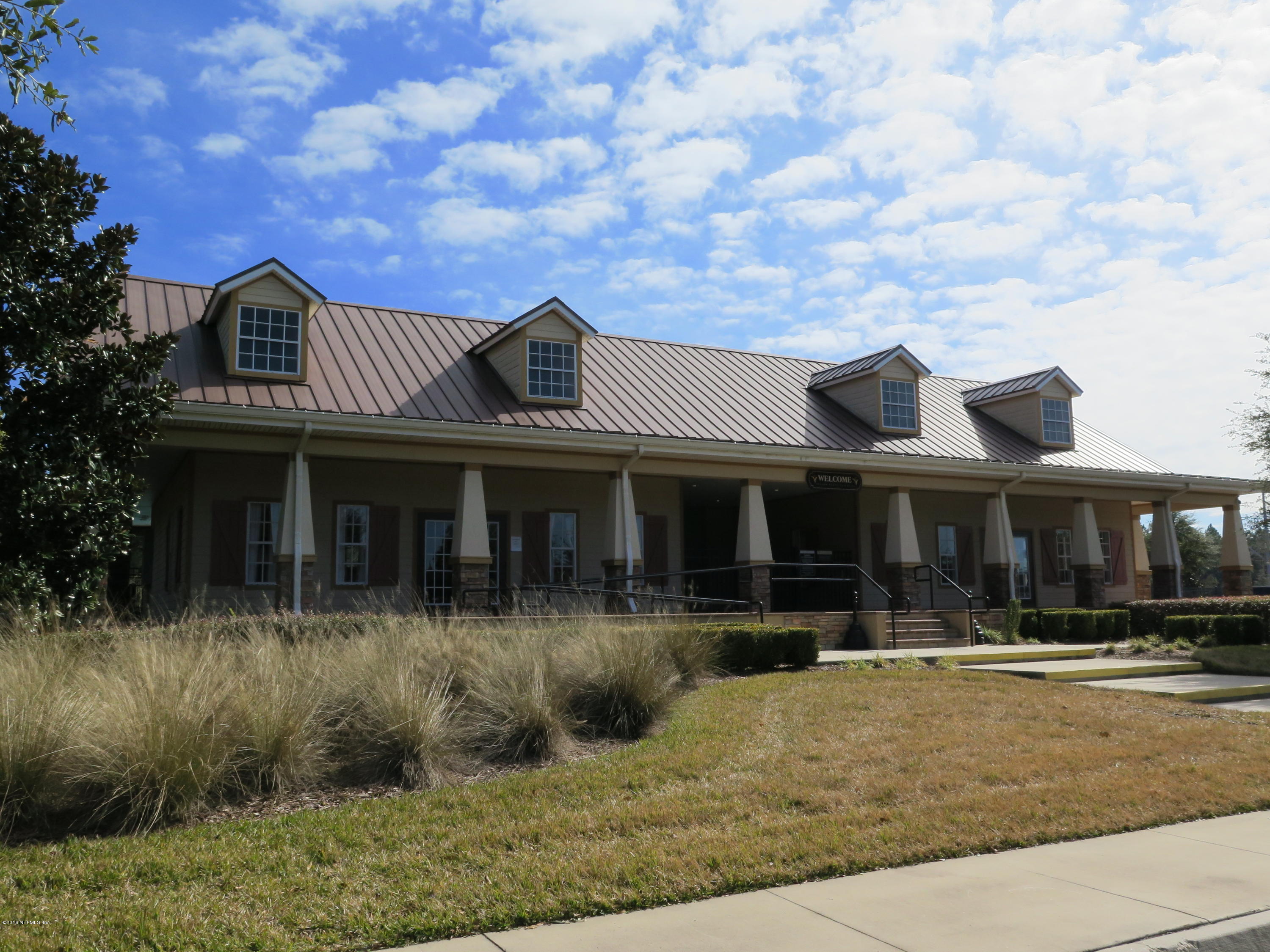 16504 Tisons Bluff Road Jacksonville, FL 32218 - Photo 24 of 34 a front view of a house with porch