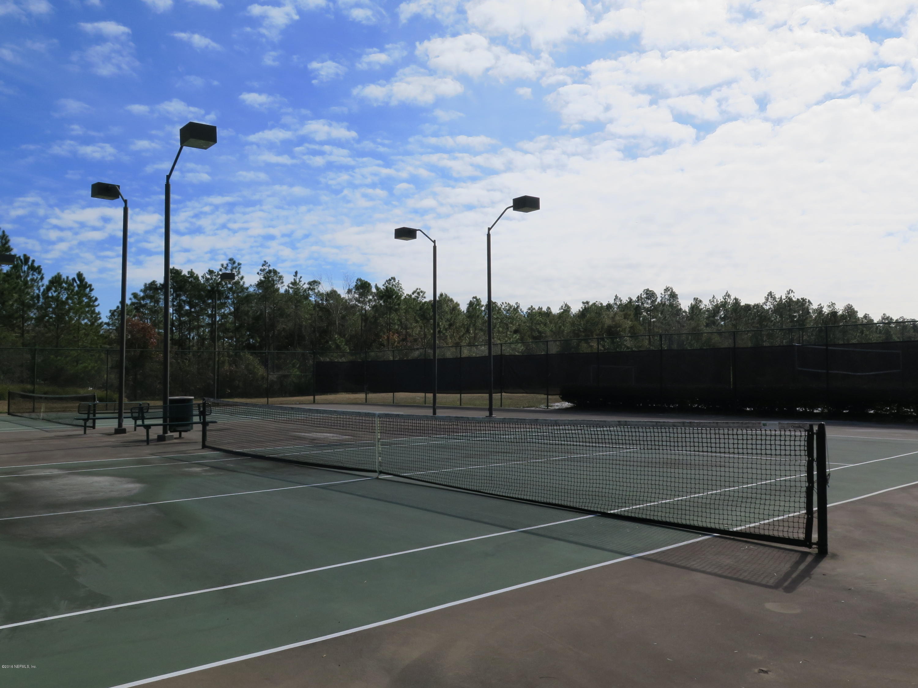 16504 Tisons Bluff Road Jacksonville, FL 32218 - Photo 29 of 34 a view of a tennis court