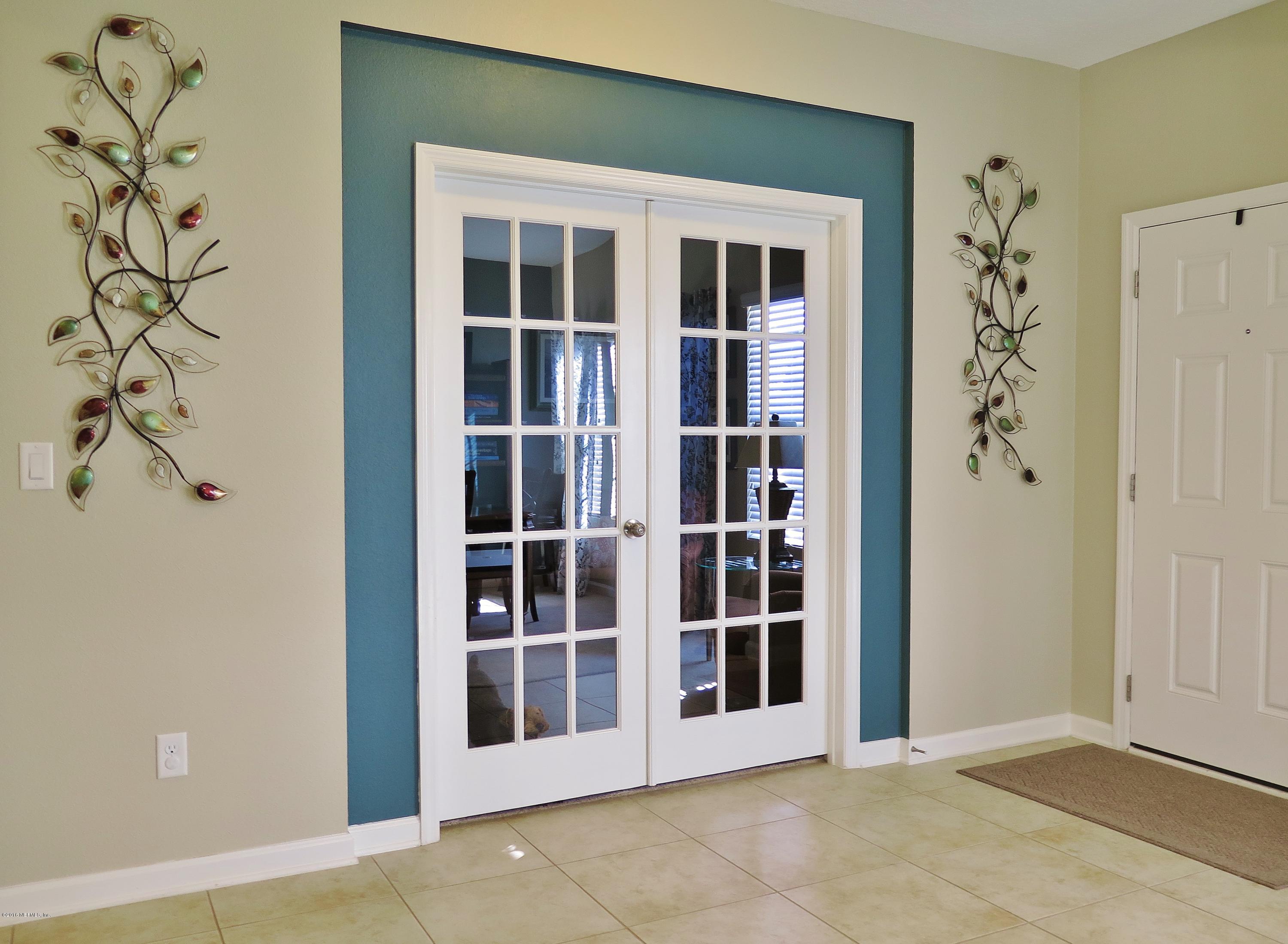 16504 Tisons Bluff Road Jacksonville, FL 32218 - Photo 3 of 34 a view of front door of house