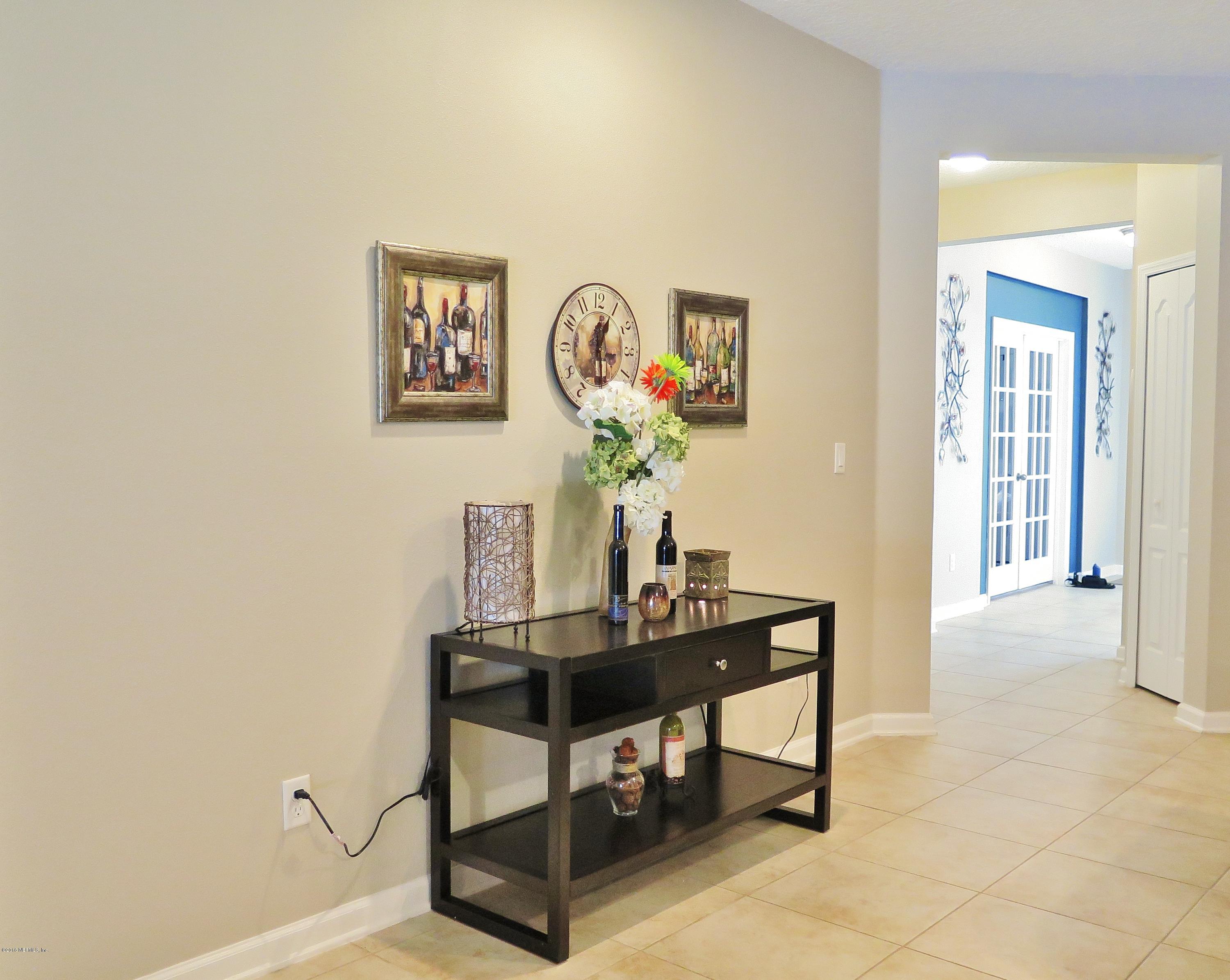 16504 Tisons Bluff Road Jacksonville, FL 32218 - Photo 7 of 34 a view of a workspace with furniture