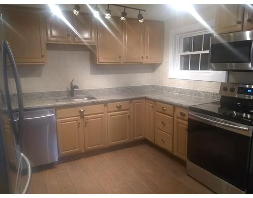31 Echo Road Brimfield, MA 01010 - Photo 7 of 26 a kitchen with a sink and cabinets