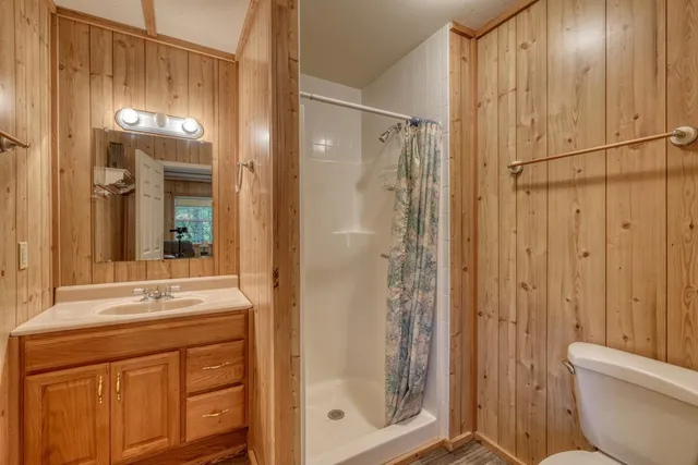 a view of a two chairs in the balcony