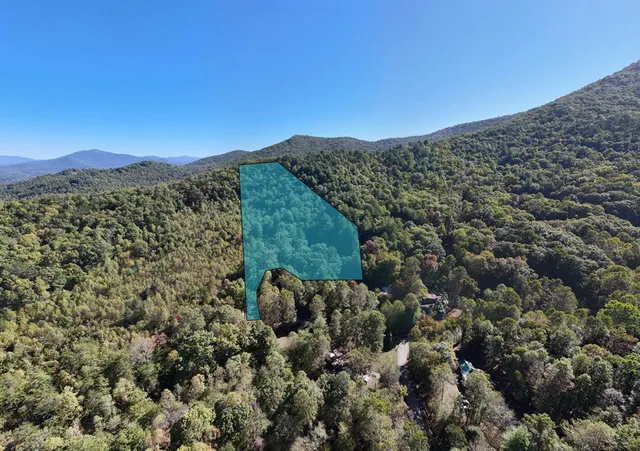 a view of a chair under an umbrella