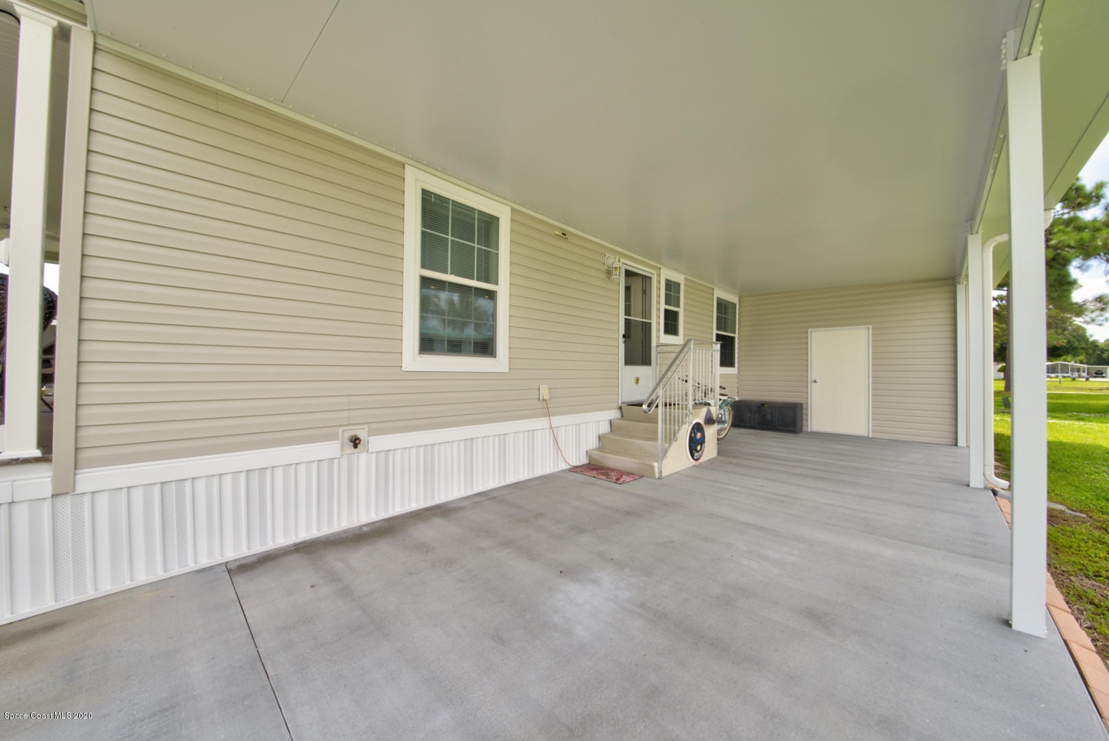 1256 Shell Court Northeast Palm Bay, FL 32907 - Photo 11 of 40 carport