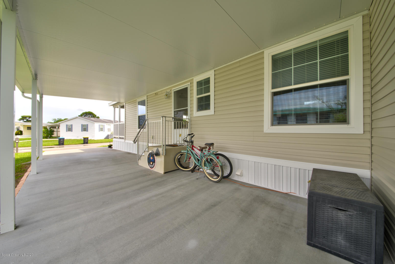 1256 Shell Court Northeast Palm Bay, FL 32907 - Photo 12 of 40 carport with side entrance
