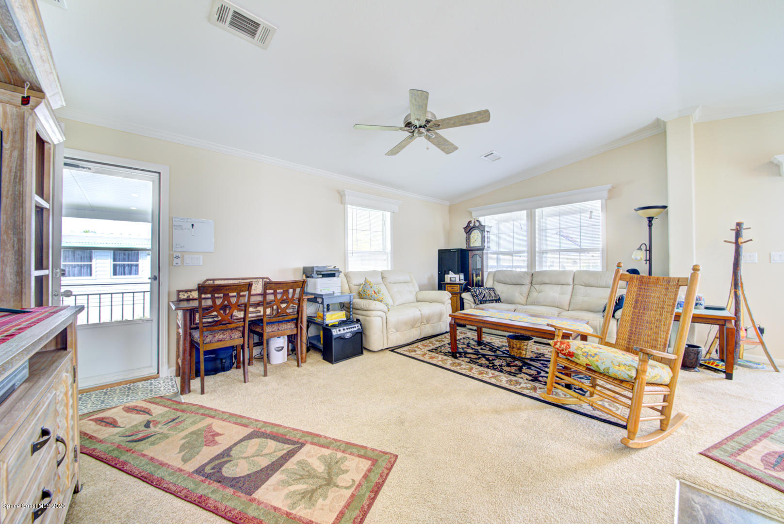 1256 Shell Court Northeast Palm Bay, FL 32907 - Photo 13 of 40 living room & entry door