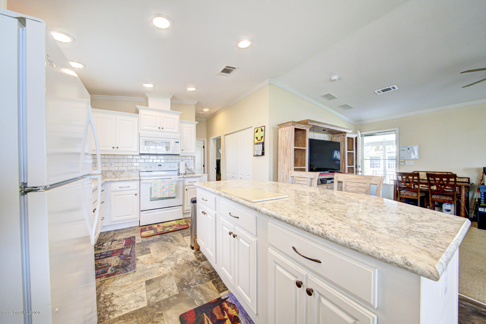 1256 Shell Court Northeast Palm Bay, FL 32907 - Photo 20 of 40 kitchen with island