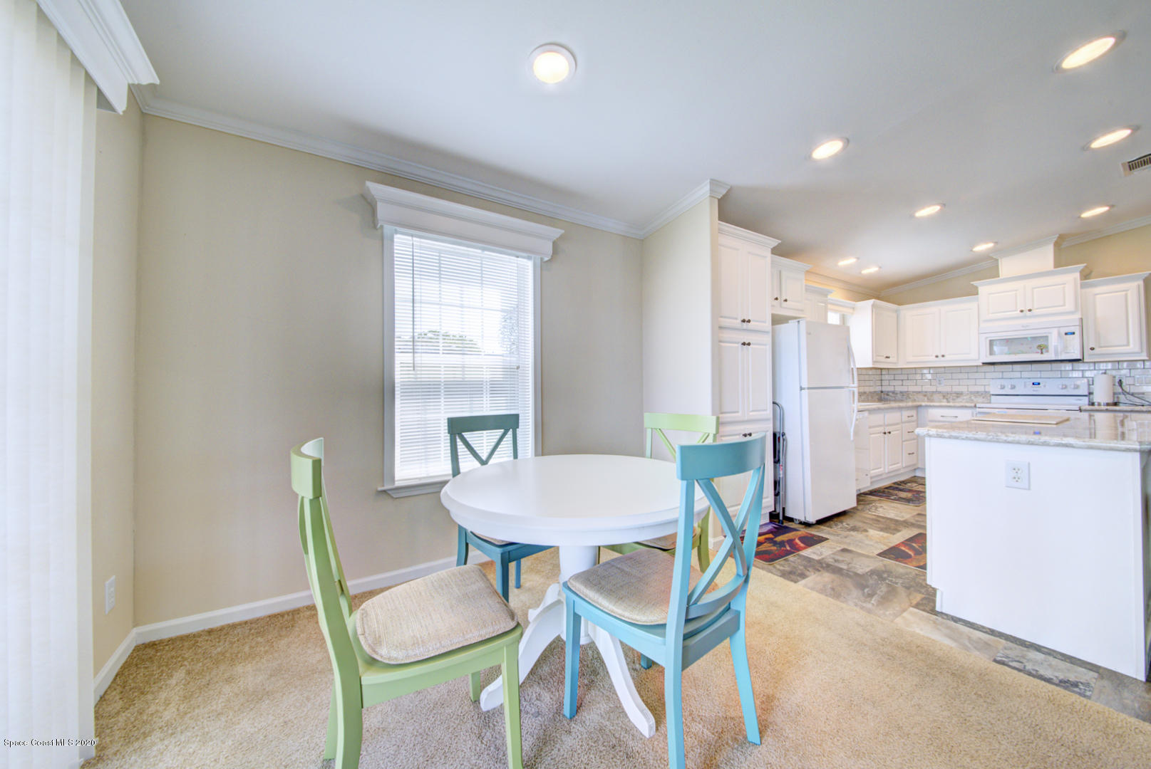 1256 Shell Court Northeast Palm Bay, FL 32907 - Photo 24 of 40 dining room off kitchen