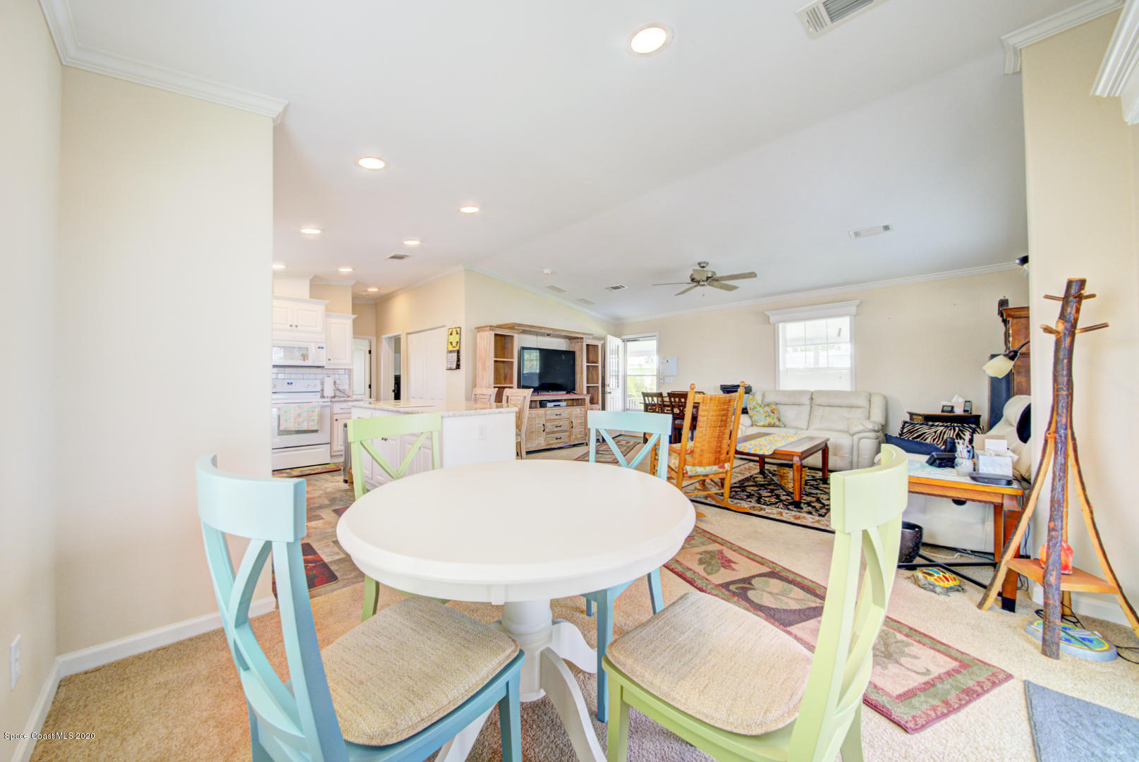 1256 Shell Court Northeast Palm Bay, FL 32907 - Photo 25 of 40 dining room open to living area